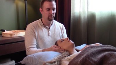 Orion Mott performing a medical intuitive reiki chakra balance session at his Toronto clinic